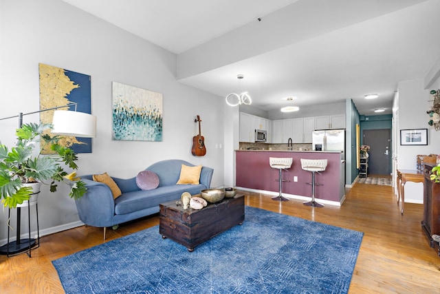 15 Freedom Way Unit 401, Jersey City, NJ 07305 - living room with light wood finished floors and baseboards