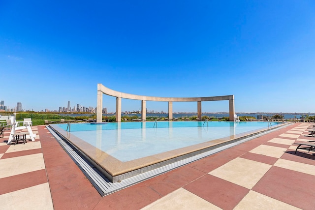 15 Freedom Way Unit 401, Jersey City, NJ 07305 - view of pool with a skyline view