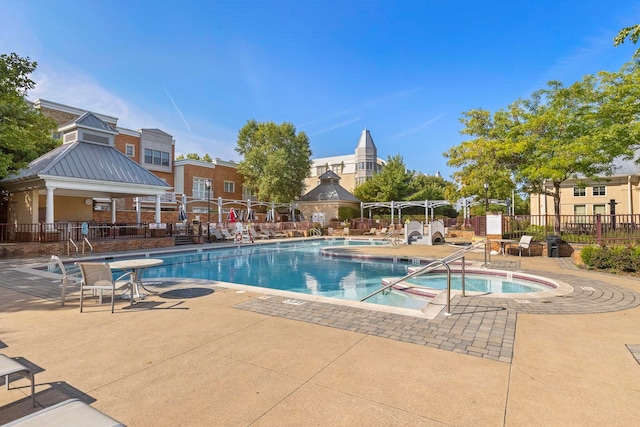 15 Freedom Way Unit 401, Jersey City, NJ 07305 - community pool with a patio area, a gazebo, and a hot tub