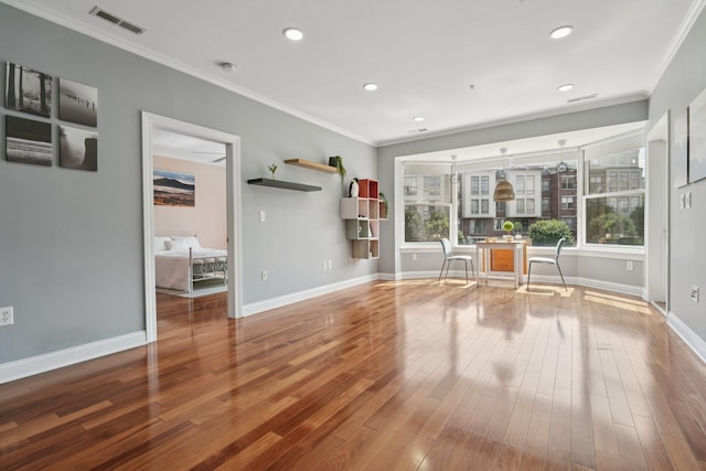 22 Ave At Port Imperial Unit 227, West New York, NJ 07093 - unfurnished living room featuring ornamental molding, wood finished floors, and recessed lighting