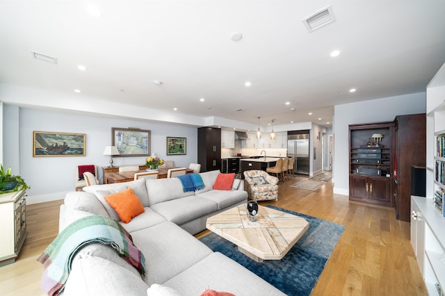 74 Madison St Unit 2, Hoboken, NJ 07030 - living area featuring light wood-type flooring, recessed lighting, and baseboards