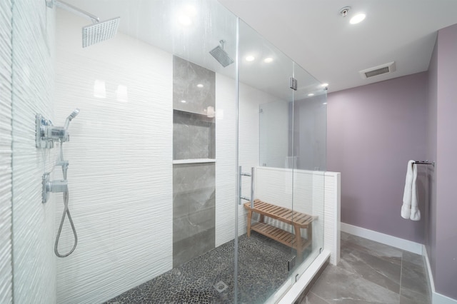 74 Madison St Unit 2, Hoboken, NJ 07030 - bathroom with a tile shower, baseboards, and recessed lighting
