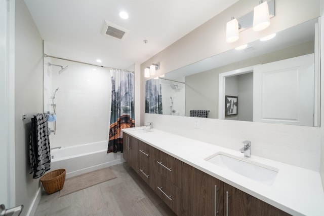 74 Madison St Unit 2, Hoboken, NJ 07030 - bathroom with shower / bathtub combination with curtain, double vanity, and recessed lighting