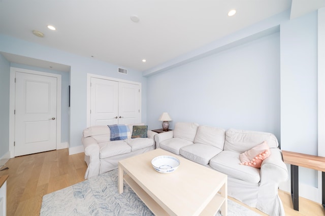 74 Madison St Unit 2, Hoboken, NJ 07030 - living room with light wood finished floors, recessed lighting, and baseboards
