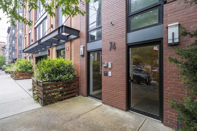 74 Madison St Unit 2, Hoboken, NJ 07030 - property entrance featuring brick siding