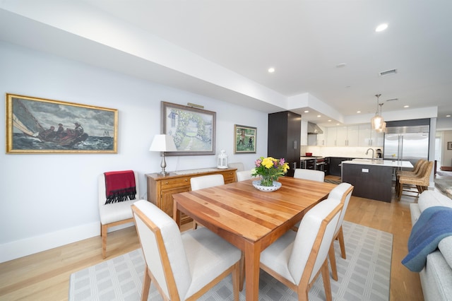 74 Madison St Unit 2, Hoboken, NJ 07030 - dining room with light wood finished floors, recessed lighting, and baseboards