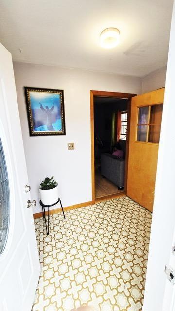 372 9th St, Fairview, NJ 07022 - hall with baseboards