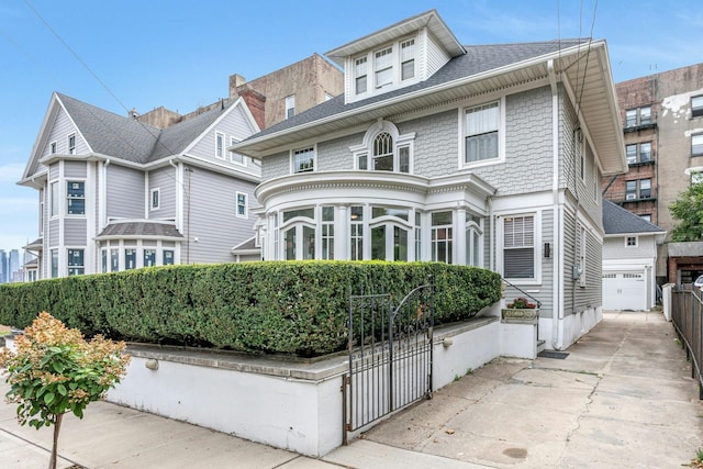 7 Clifton Ter, Weehawken, NJ 07086 - view of front of home featuring driveway and a garage