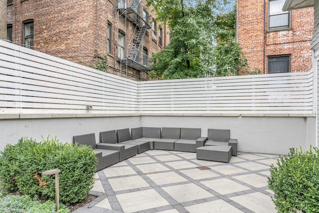 7 Clifton Ter, Weehawken, NJ 07086 - fenced backyard featuring a patio and outdoor lounge area