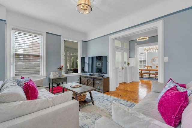 7 Clifton Ter, Weehawken, NJ 07086 - living area with a chandelier