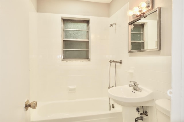 7017 Columbia Ave Unit 3C, North Bergen, NJ 07047 - bathroom featuring bathtub / shower combination and tile walls