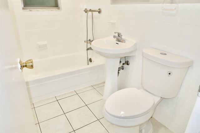 7017 Columbia Ave Unit 3C, North Bergen, NJ 07047 - full bathroom featuring tile walls, tub / shower combination, and tile patterned flooring