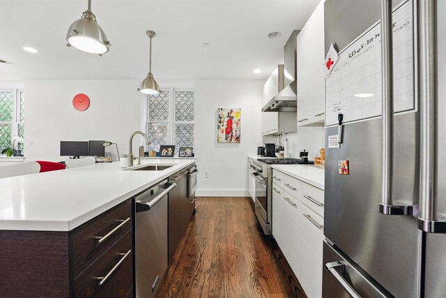 304 Pavonia Ave Unit 202, Jersey City, NJ 07302 - kitchen with premium appliances, light countertops, dark brown cabinetry, dark wood finished floors, and white cabinetry