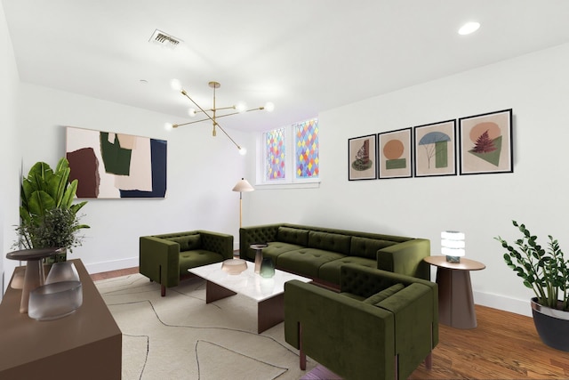 304 Pavonia Ave Unit 202, Jersey City, NJ 07302 - living area featuring a chandelier, wood finished floors, and recessed lighting