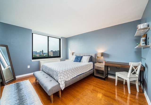 700 Grove St Unit 11P, Jersey City, NJ 07310 - bedroom with wood finished floors
