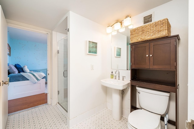 700 Grove St Unit 11P, Jersey City, NJ 07310 - ensuite bathroom featuring toilet and a shower stall
