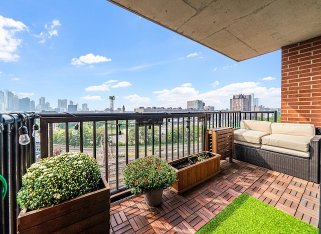 700 Grove St Unit 11P, Jersey City, NJ 07310 - balcony with a skyline view and outdoor lounge area