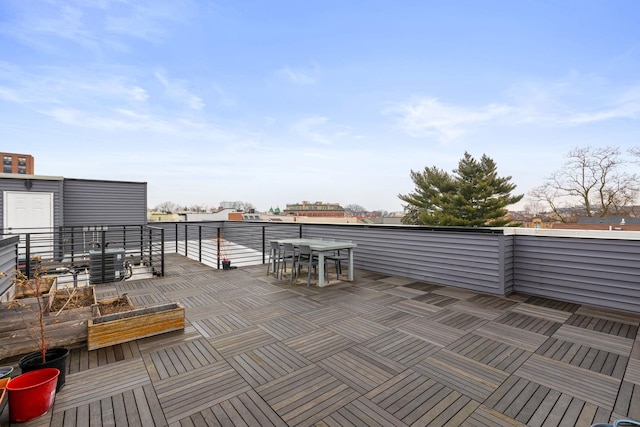 view of patio / terrace featuring a balcony and central air condition unit