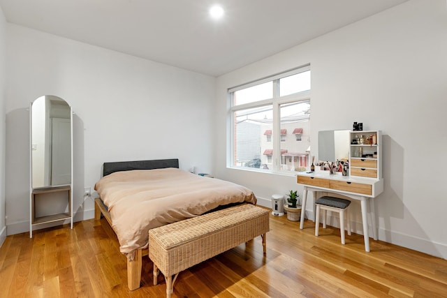 bedroom featuring light hardwood / wood-style floors