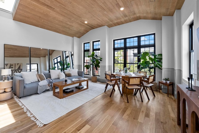 166 New York Ave Unit 2, Jersey City, NJ 07307 - living room with wainscoting, light wood finished floors, wood ceiling, a decorative wall, and recessed lighting