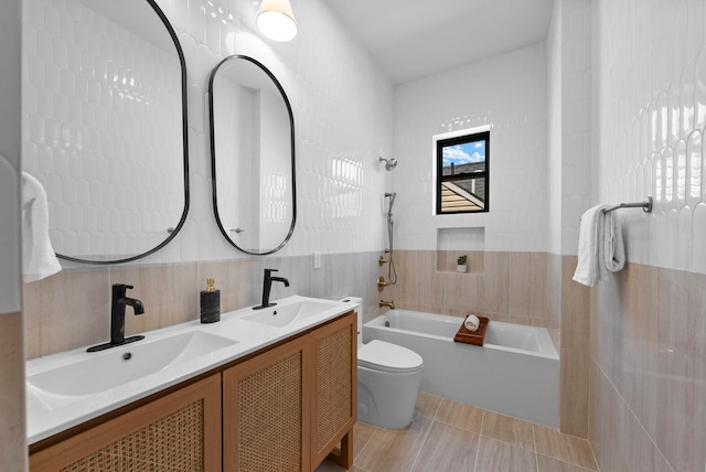 166 New York Ave Unit 2, Jersey City, NJ 07307 - bathroom featuring tile walls, shower / bath combination, and double vanity