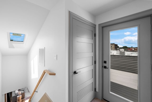 166 New York Ave Unit 2, Jersey City, NJ 07307 - doorway to outside featuring a skylight and healthy amount of natural light