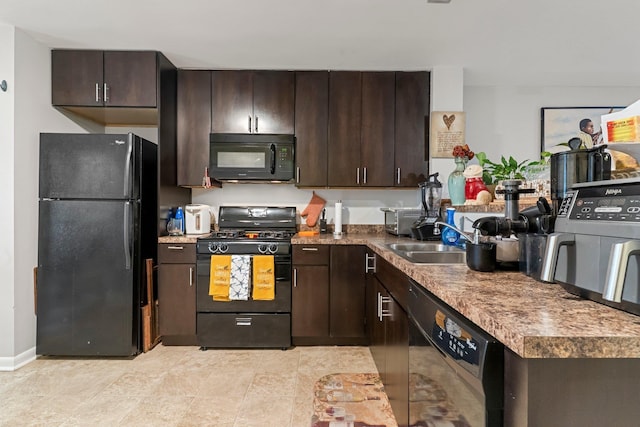 437 Rose Ave, Jersey City, NJ 07305 - kitchen featuring black appliances, dark brown cabinetry, and a sink