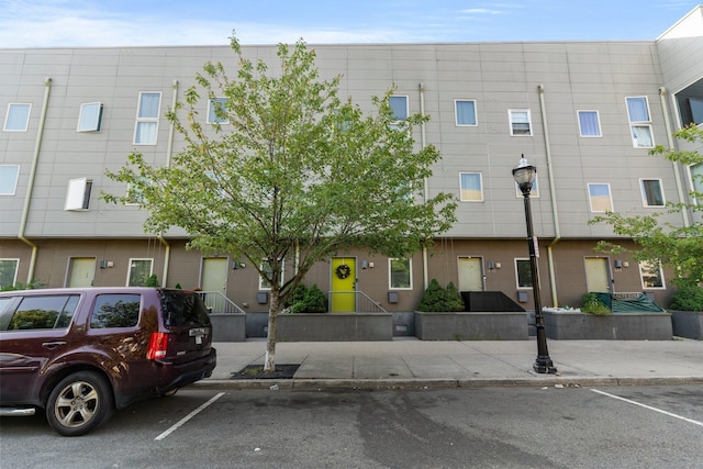437 Rose Ave, Jersey City, NJ 07305 - view of building exterior featuring uncovered parking