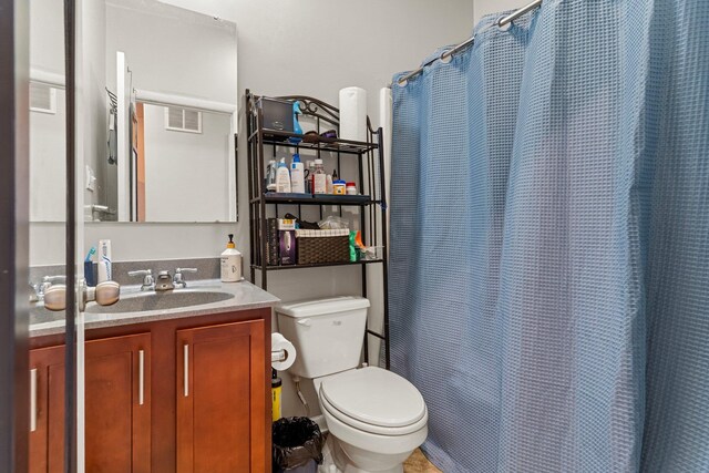 437 Rose Ave, Jersey City, NJ 07305 - bathroom with toilet, vanity, and a shower with curtain