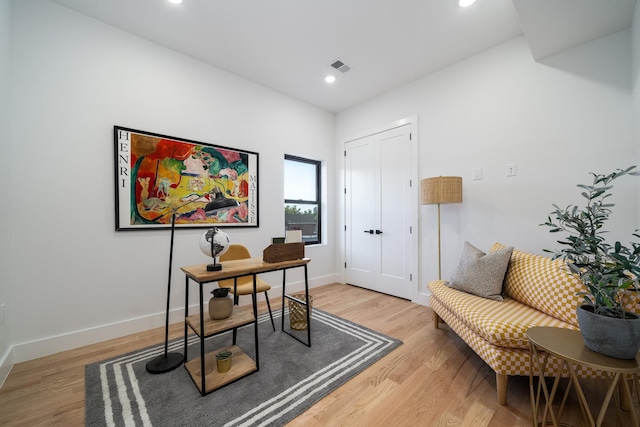 office with visible vents, recessed lighting, baseboards, and light wood-style floors