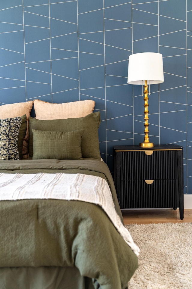 bedroom featuring wood finished floors