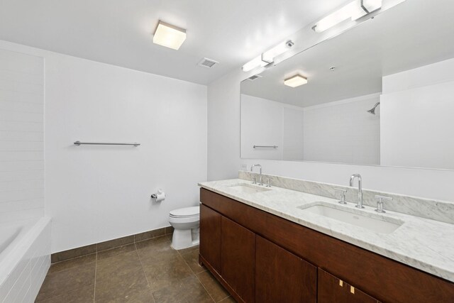 bathroom with toilet and vanity