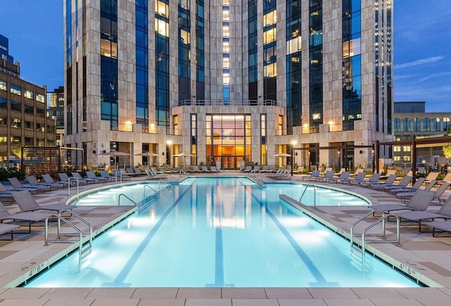 view of swimming pool featuring a patio area