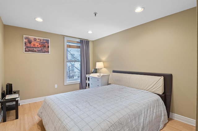 bedroom with light wood-type flooring