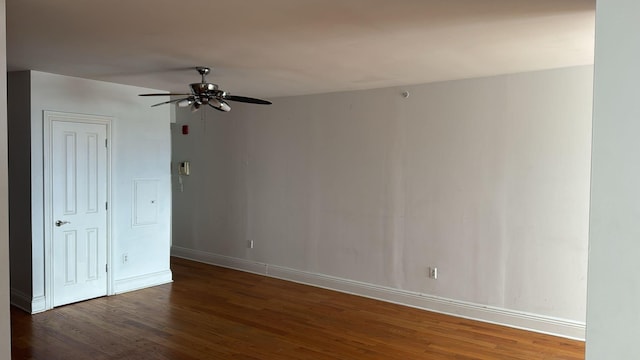 809 22nd St Unit 905, Union City, NJ 07087 - empty room featuring wood finished floors, a ceiling fan, and baseboards