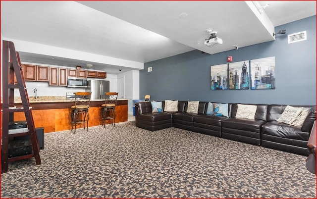 809 22nd St Unit 905, Union City, NJ 07087 - carpeted living area featuring bar with sink