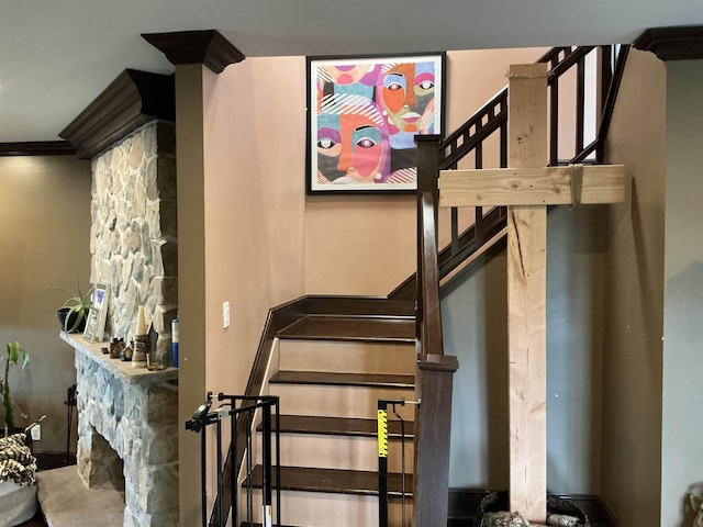308 Sea Isle Ky Unit 308, Secaucus, NJ 07094 - stairway featuring crown molding and a stone fireplace
