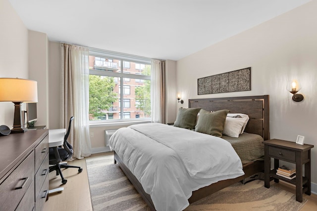 1400 Hudson St Unit 511, Hoboken, NJ 07030 - bedroom featuring light wood finished floors and a desk