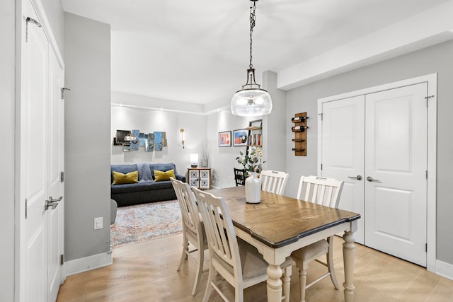 1400 Hudson St Unit 511, Hoboken, NJ 07030 - dining space with baseboards and light wood finished floors