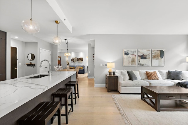 1400 Hudson St Unit 511, Hoboken, NJ 07030 - living area with light wood-style floors and baseboards