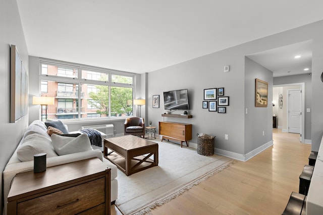 1400 Hudson St Unit 511, Hoboken, NJ 07030 - living area with light wood-style flooring and recessed lighting