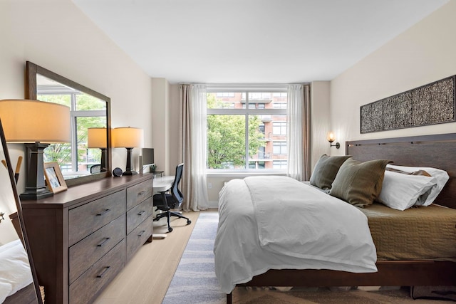 1400 Hudson St Unit 511, Hoboken, NJ 07030 - bedroom with light wood-style floors and a desk