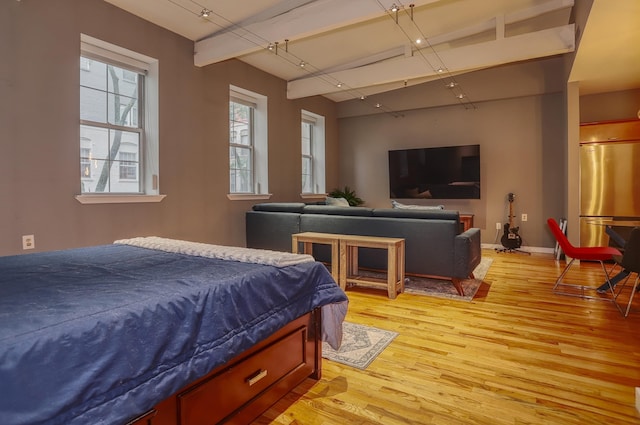 1034 Clinton St Unit 208, Hoboken, NJ 07030 - bedroom featuring freestanding refrigerator and light wood-type flooring
