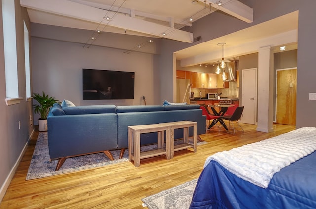 1034 Clinton St Unit 208, Hoboken, NJ 07030 - living area with light wood finished floors and baseboards
