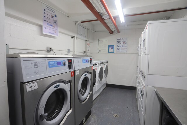 1034 Clinton St Unit 208, Hoboken, NJ 07030 - community laundry room featuring stacked washing machine and dryer, separate washer and dryer, and concrete block wall