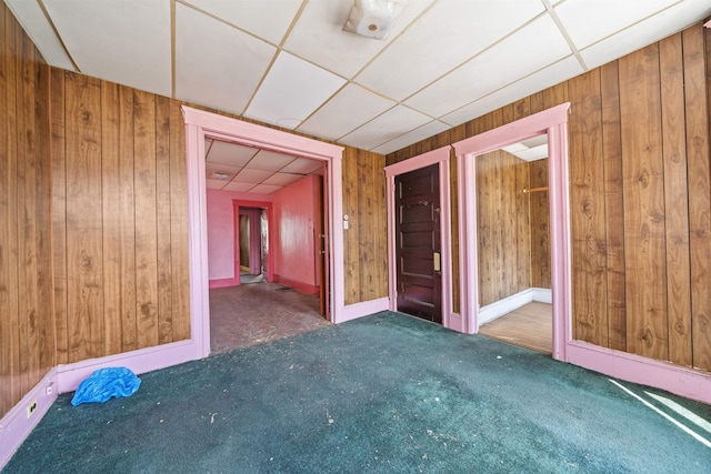 152 Bidwell Ave, Jersey City, NJ 07305 - carpeted spare room featuring wooden walls and a paneled ceiling