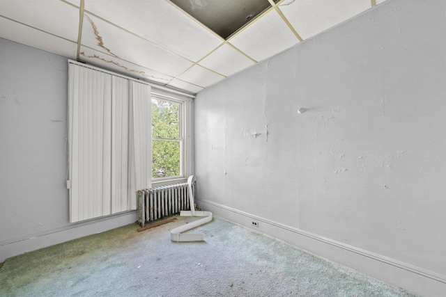 152 Bidwell Ave, Jersey City, NJ 07305 - carpeted empty room featuring radiator heating unit and baseboards