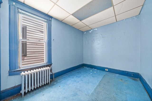 152 Bidwell Ave, Jersey City, NJ 07305 - spare room with radiator, carpet, and a paneled ceiling