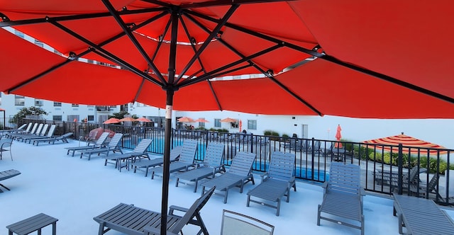 view of patio / terrace featuring fence