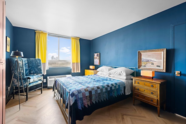 bedroom featuring a wall mounted AC
